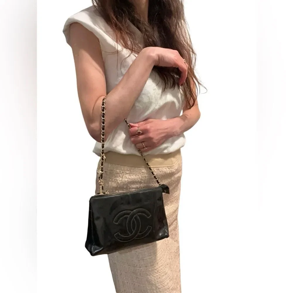 Chanel Black Pouch Bag with Iconic Logo added chain